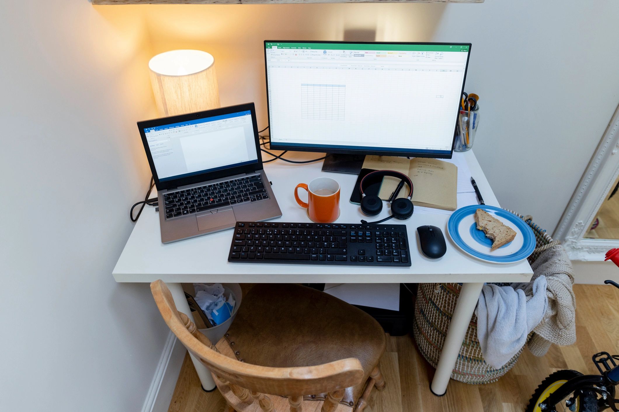 Office desk setup with monitors and workspace accessories