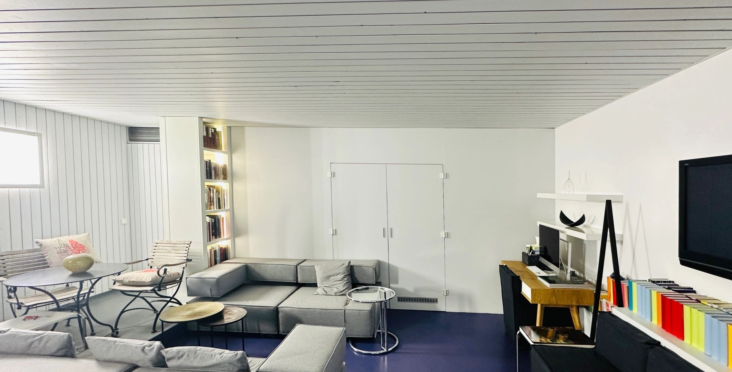Home office with sofa and desk