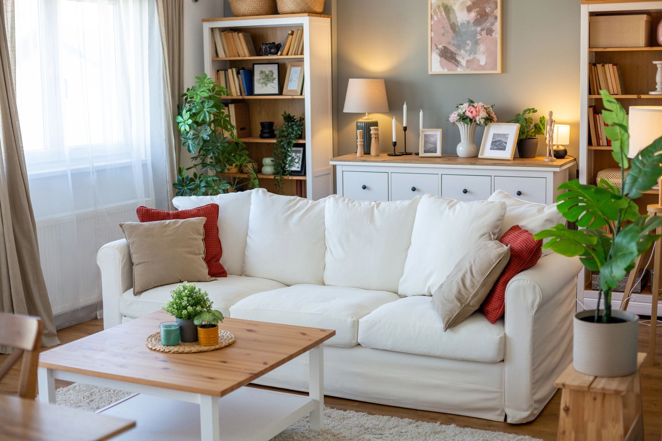 Cozy white sofa in a styled living room