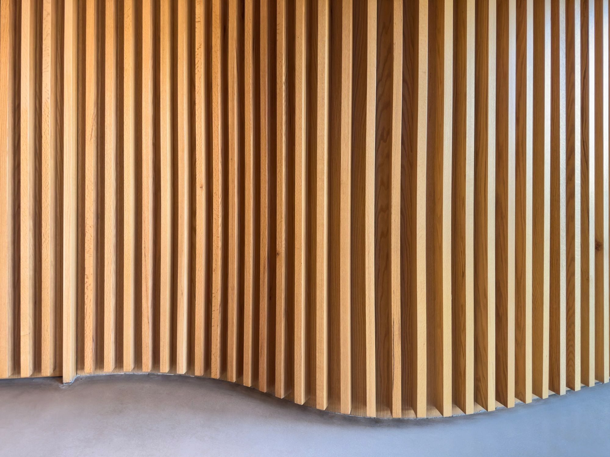 Wood finish detail for custom wardrobe craftsmanship